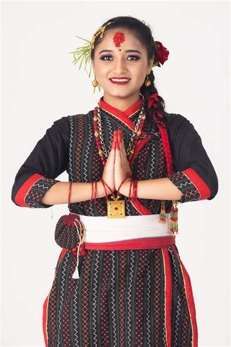 A Traditional Newari Girl Doing Namaste And Celebrating Dashain