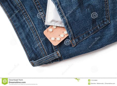 condoms in package in jeans safe sex concept healthcare medicine