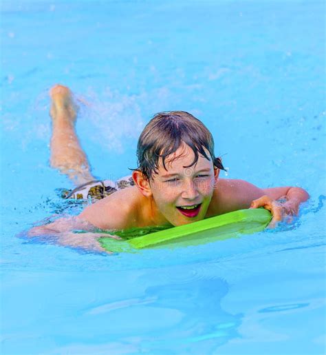teen boy swimming   pool stock image image  caucasian outdoor