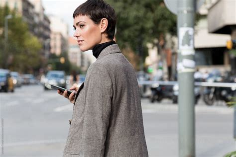 Stylish Short Haired Business Woman Commuting Between Meetings On A