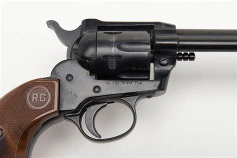 rohm model  single action revolver  magnum cal   barrel black finish brown checkered