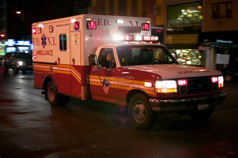 nyfd  york fire department medic ambulance  flashing lights   york city street