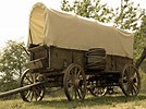 Image result for american pioneer in covered wagons