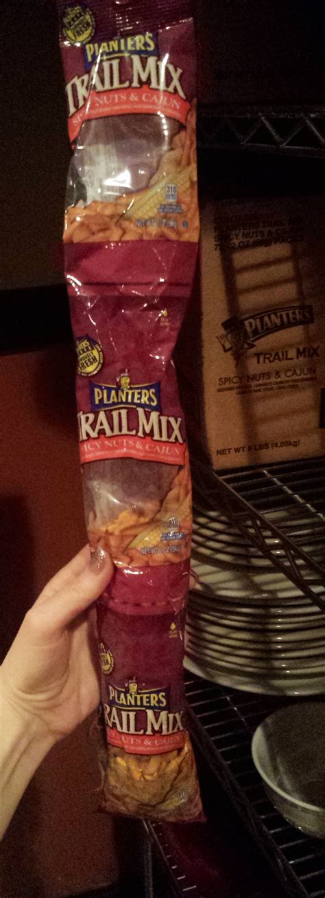 Three Bags Of Trail Mix Stuck Together One Giant Bag Of Spicy Nuts