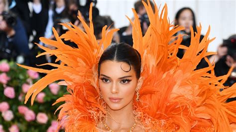 Kendall Jenners 2019 Met Gala Outfit Was Highlighter Orange And Full Of