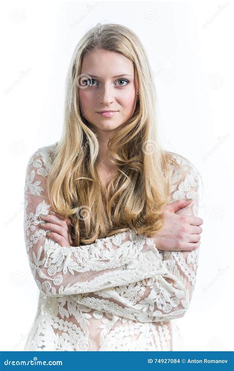 beautiful russian blonde girl on a white background in a white