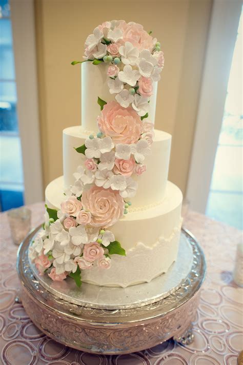 tier wedding cake  cascading fondant flowers