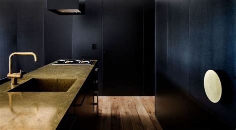 black  gold accents  tastefully    australian apartment gold interior
