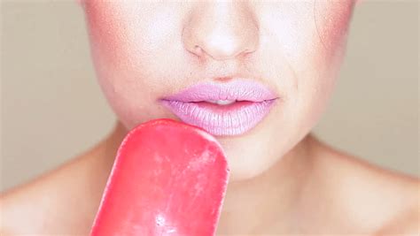 woman s tongue seductively licking lips close up stock footage video 1856515 shutterstock