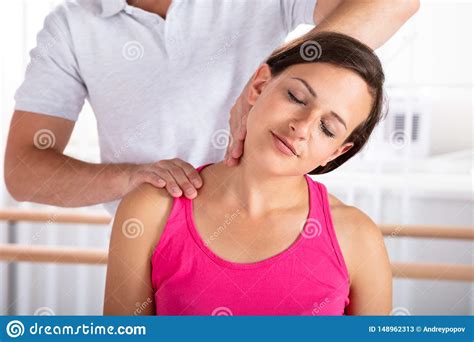 Therapist Massaging Woman`s Shoulder Stock Image Image Of
