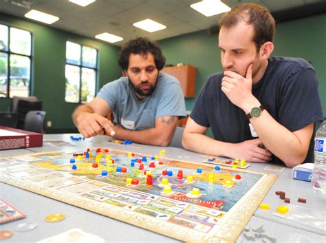 people   ages reconnect  board games  daily courier