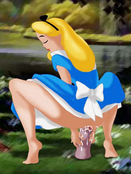 alice in wonderland nude is bouncing on dildo on a glade