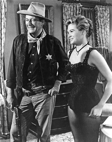 duke and angie dickinson on the set of rio bravo 1959 john wayne