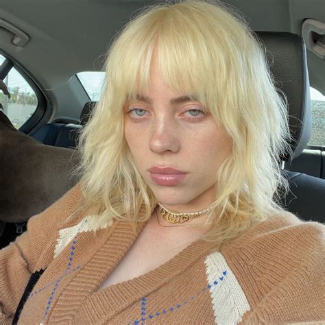 billie eilish knows you re comparing her vogue photo shoots and she