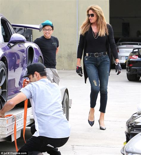 caitlyn jenner tows purple porsche to the shop on flatbed trailer daily mail online