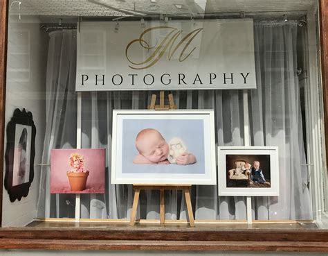 photography studio window display store front newbornphotostudiophotographystudioidea