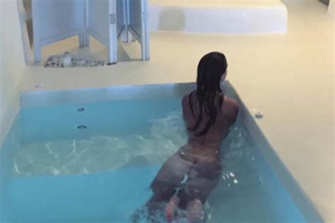 swimming in sex appeal naked emily ratajkowski in poolside peepshow
