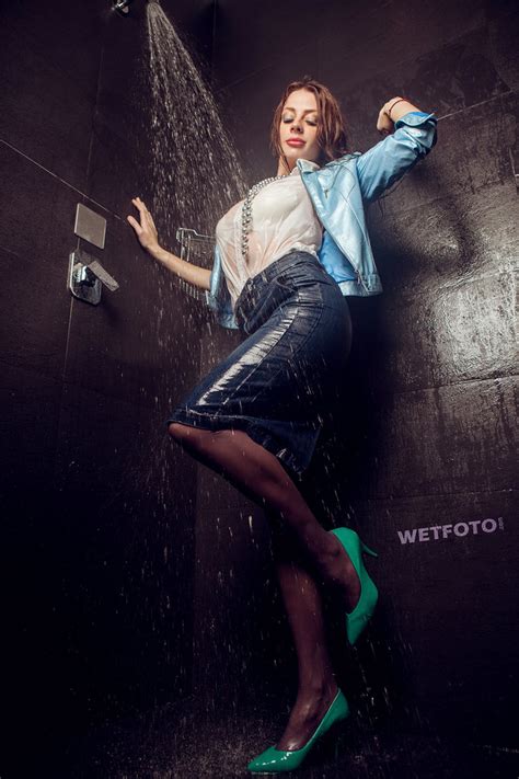 wetfoto girl swims and gets wet in jeans skirt wetlook with wetfoto