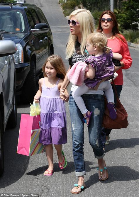 tori spelling puts on brave face as she takes daughters to birthday