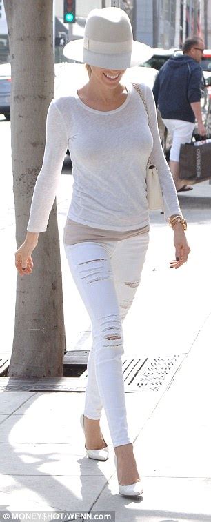 Kristin Cavallari Wears Head To Toe White While Flashing Hint Of Flesh