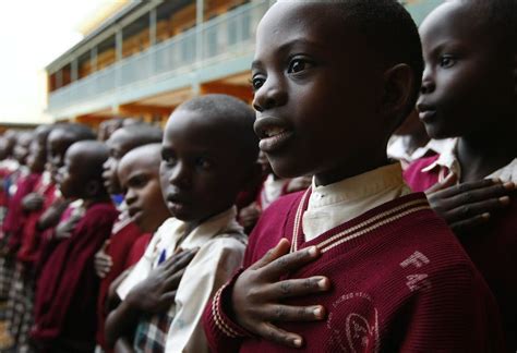 east african kids attend school      learning
