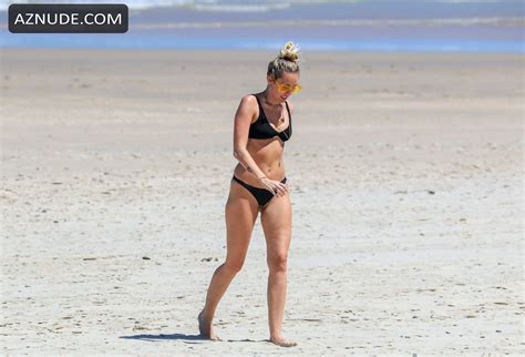 miley cyrus wears a black bikini at the beach in byron bay australia 09 01 2018 aznude