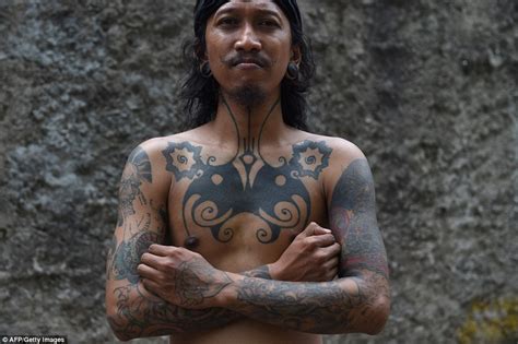 Indonesian Tattooists Revive Tribal Traditions Of Hand Tapping Daily
