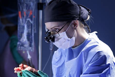 learned    woman surgeon   operating room