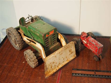 buddy al metal toy tractor  ertl red metal toy tractor john