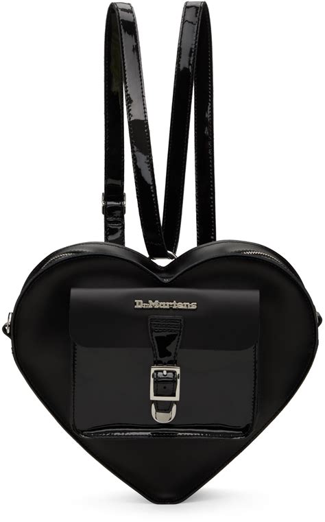 dr martens black heart shaped backpack ssense canada
