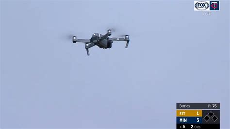 twins pirates game paused due  unidentified drone  field