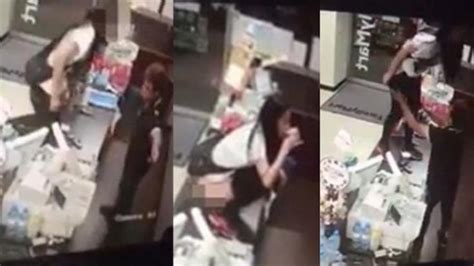taiwanese woman climbs onto shop counter to pee then