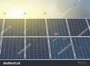 solar panels  sunny yellow sunset stock photo  shutterstock