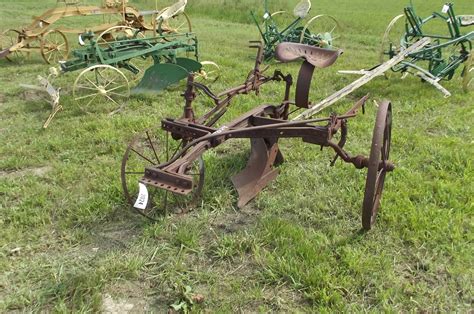 antique john deere   row plow  wheel horse drawn