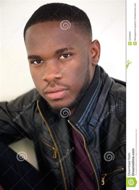 Handsome African American Man Posing In Black Leather