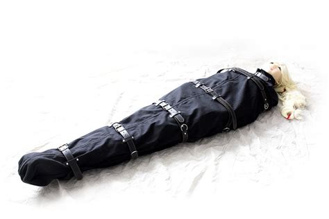 black canvas bondage sleep sack with leather straps body encasement