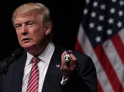donald trump accepts purple heart gift  wounded veteran   easier  combat