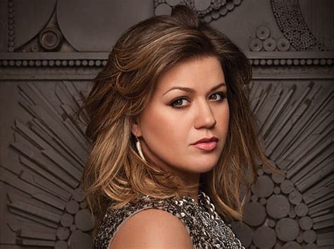 stronger review kelly clarkson unleashes inner strength but falls