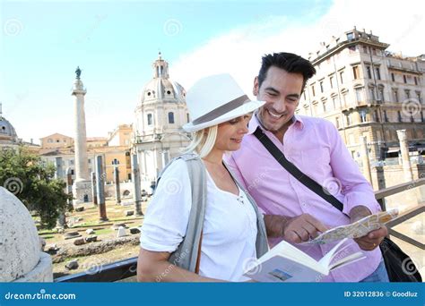 cheerful tourists  map  travel  rome stock photo image  caucasian rome
