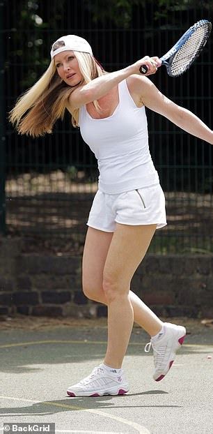 Caprice Bourret Works Up A Sweat As She Dons An All White Ensemble To