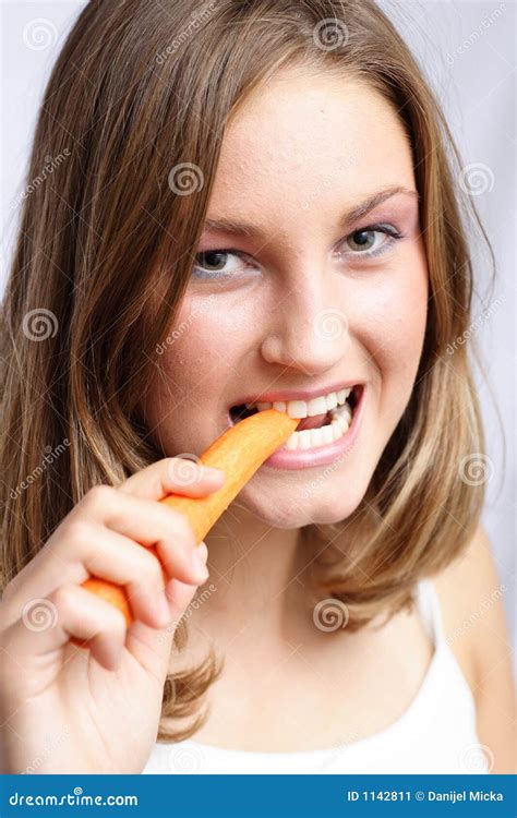 eating carrot stock image image  health young holding