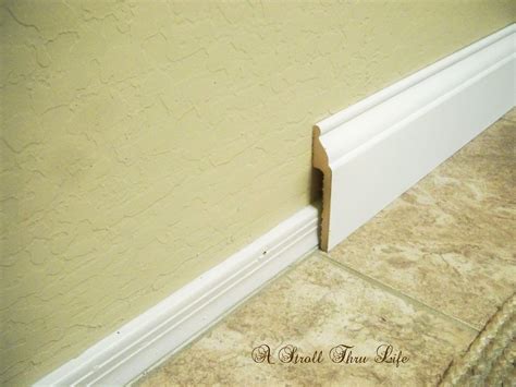 stroll  life install wide baseboard molding  existing narrow