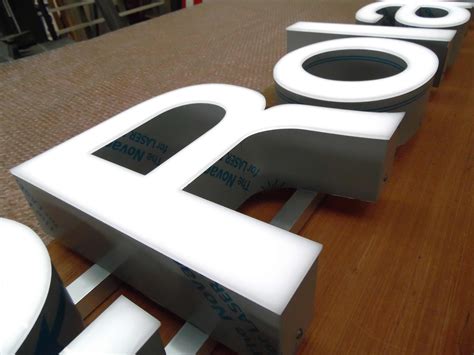 built  metal letter  acrylic face signs letters signage design retail signs