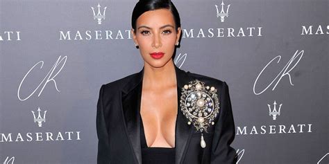 kim kardashian wears plunging black suit to fashion party in paris