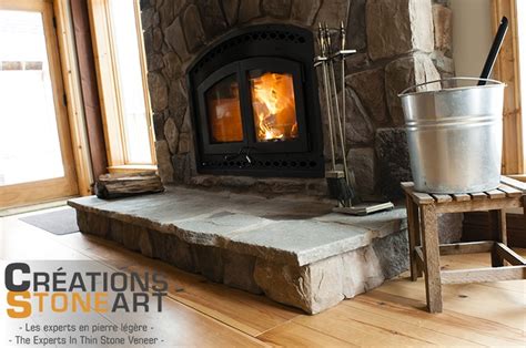 fireplace done with tudor old country fieldstone from