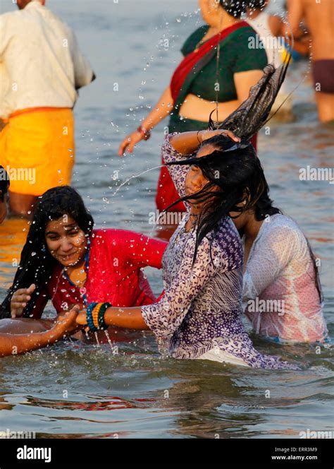 allahabad india 07th june 2015 girls taking a bath in the waters of