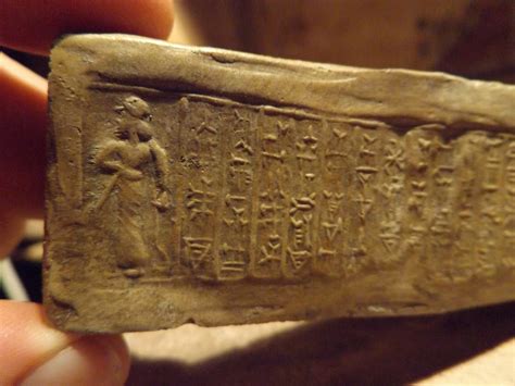 mesopotamian cuneiform writing  cylinder seal impression kassite