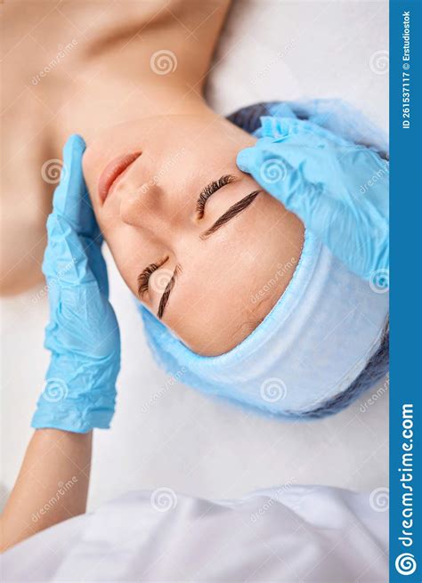 young beautiful woman receiving facial massage spa stock image image
