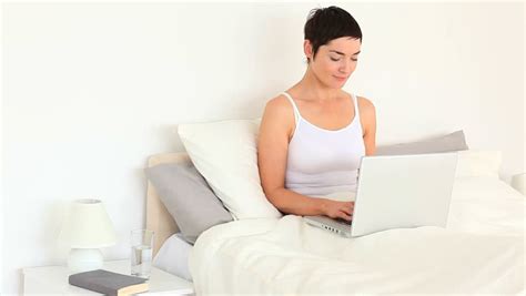 nude woman hugging pillow on bed stock footage video 3551873 shutterstock