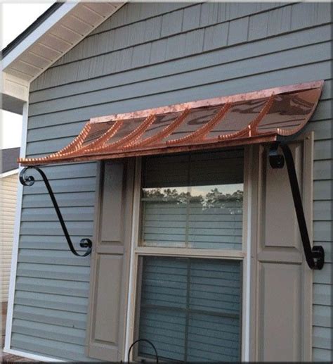 awning   side   house  front   window  brick trim